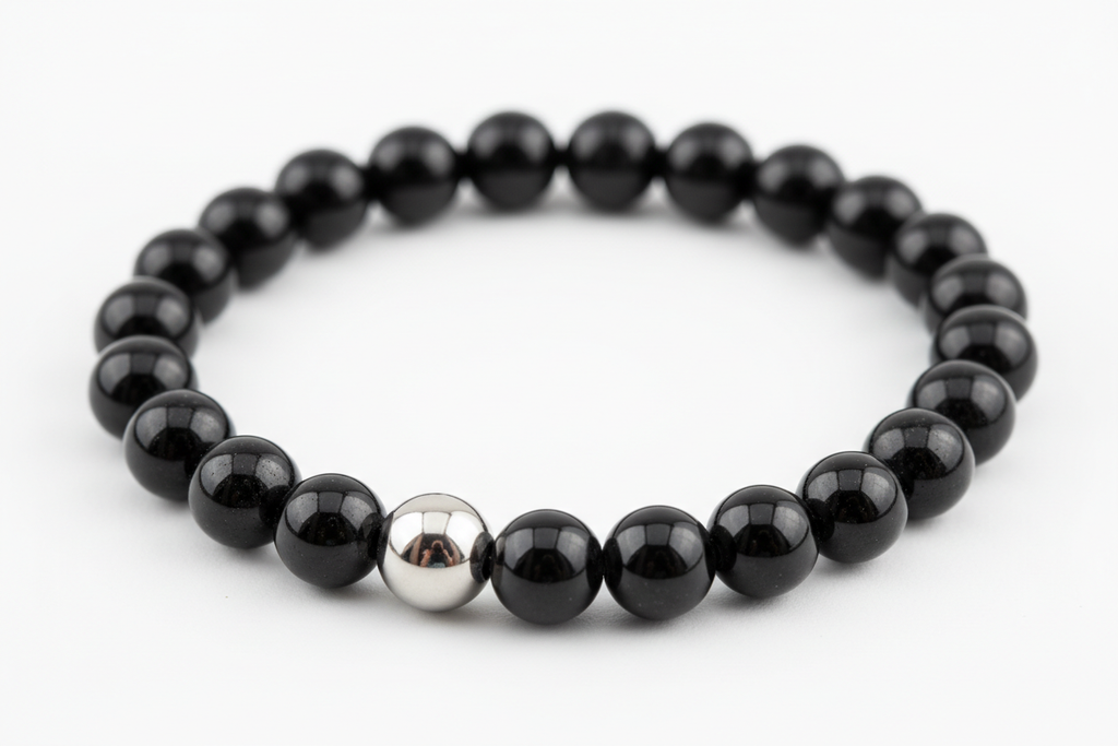 Bracciale 8mm onice nero con distanziatore in acciaio rotondo