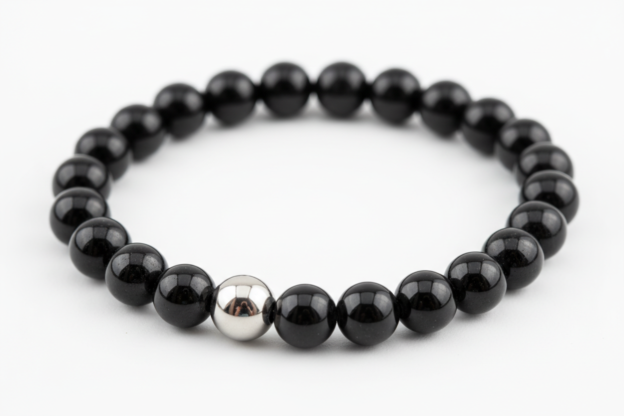 Bracciale 8mm onice nero con distanziatore in acciaio rotondo